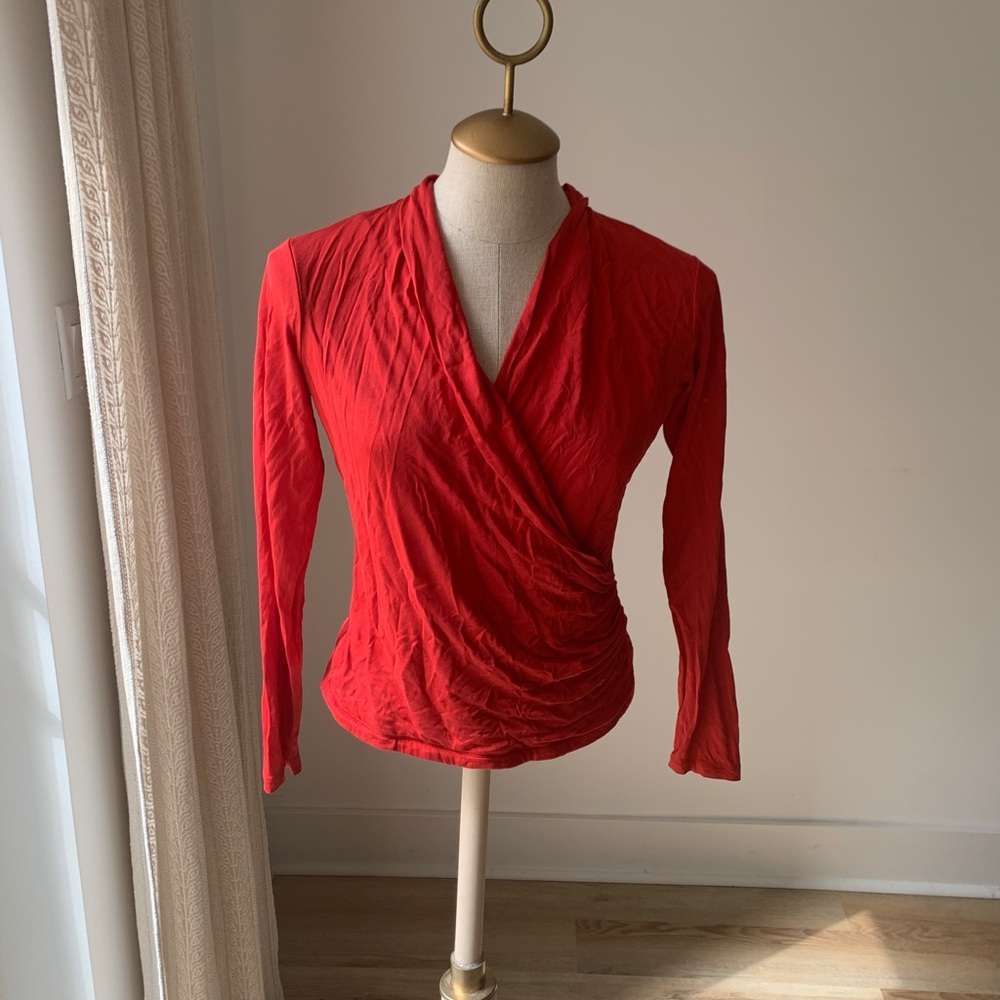 Red silk blouse
